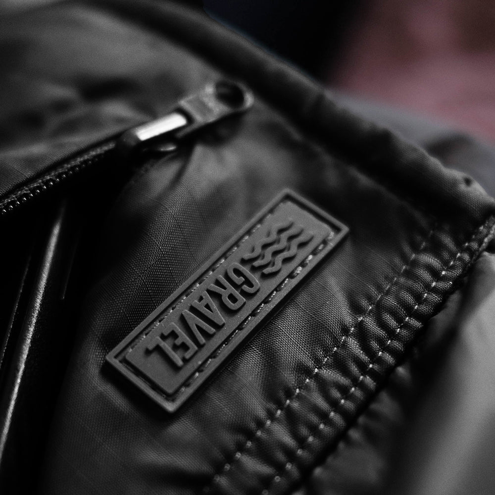 Layover™ Black Puffy Travel Blanket with Packable Stuff Sack