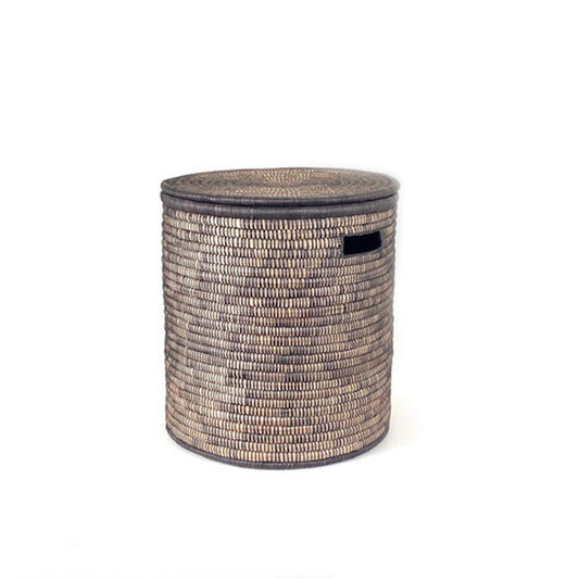A medium-sized Black Malawi Basket made of woven palm leaves with a flat lid, featuring a monochromatic black and natural color design.