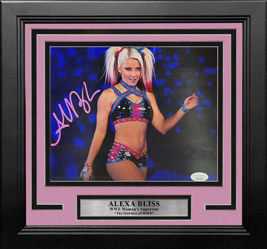 Framed photo of Alexa Bliss in a wrestling outfit with pink and black frame