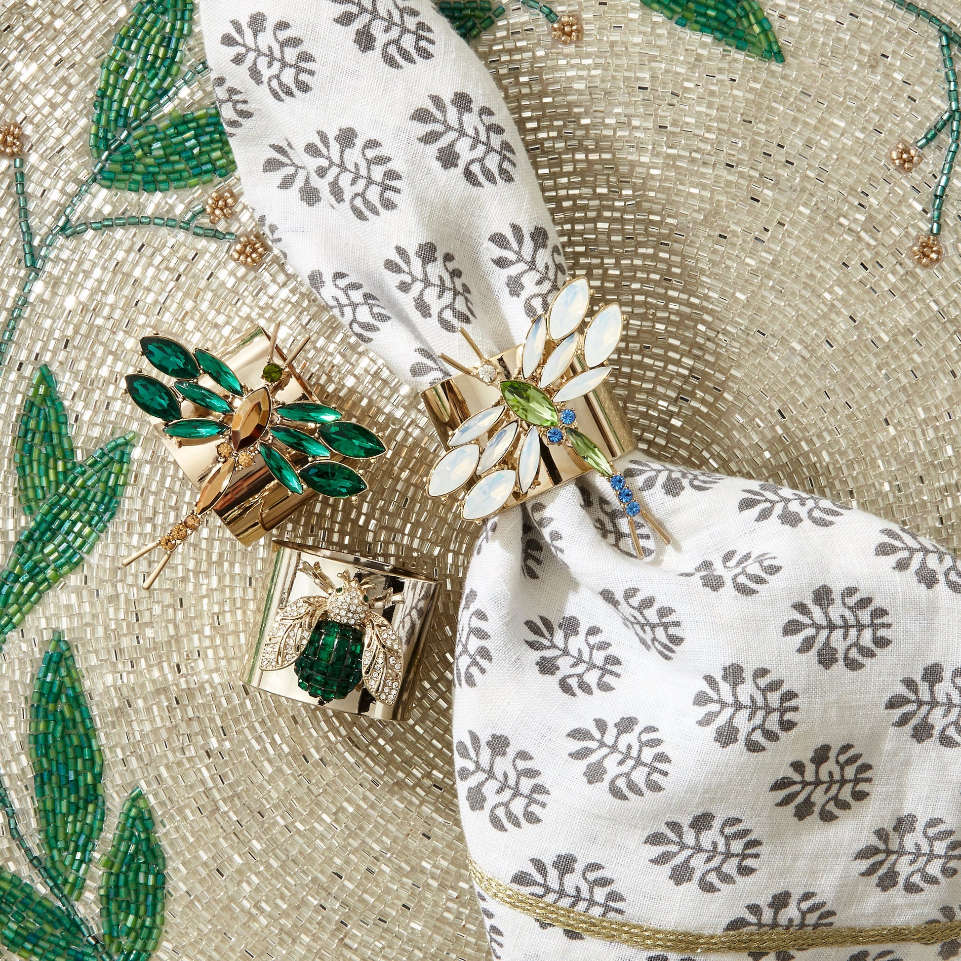 Close-up view of the Joanna Buchanan mistletoe placemat showing intricate beadwork