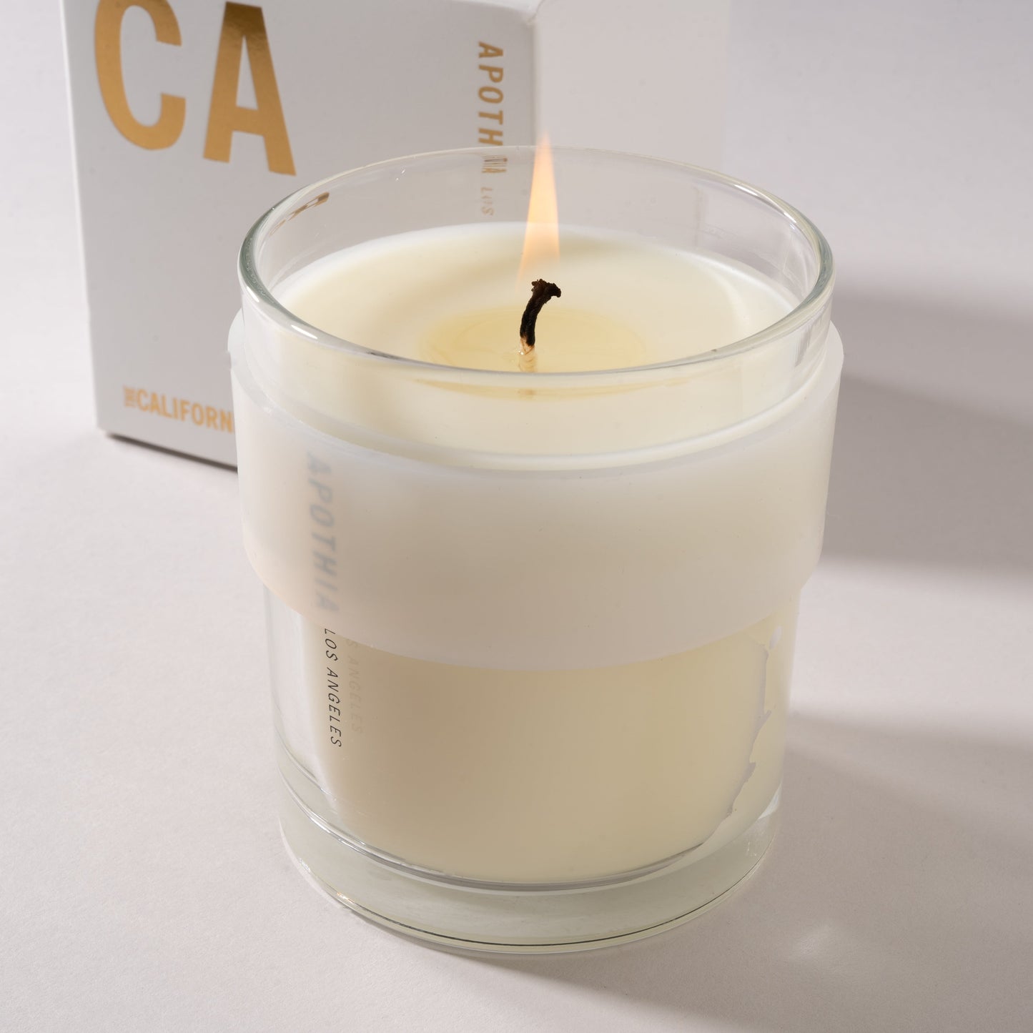 California Candle with Exotic Flowers, Green Leaves, Citrus & Musk