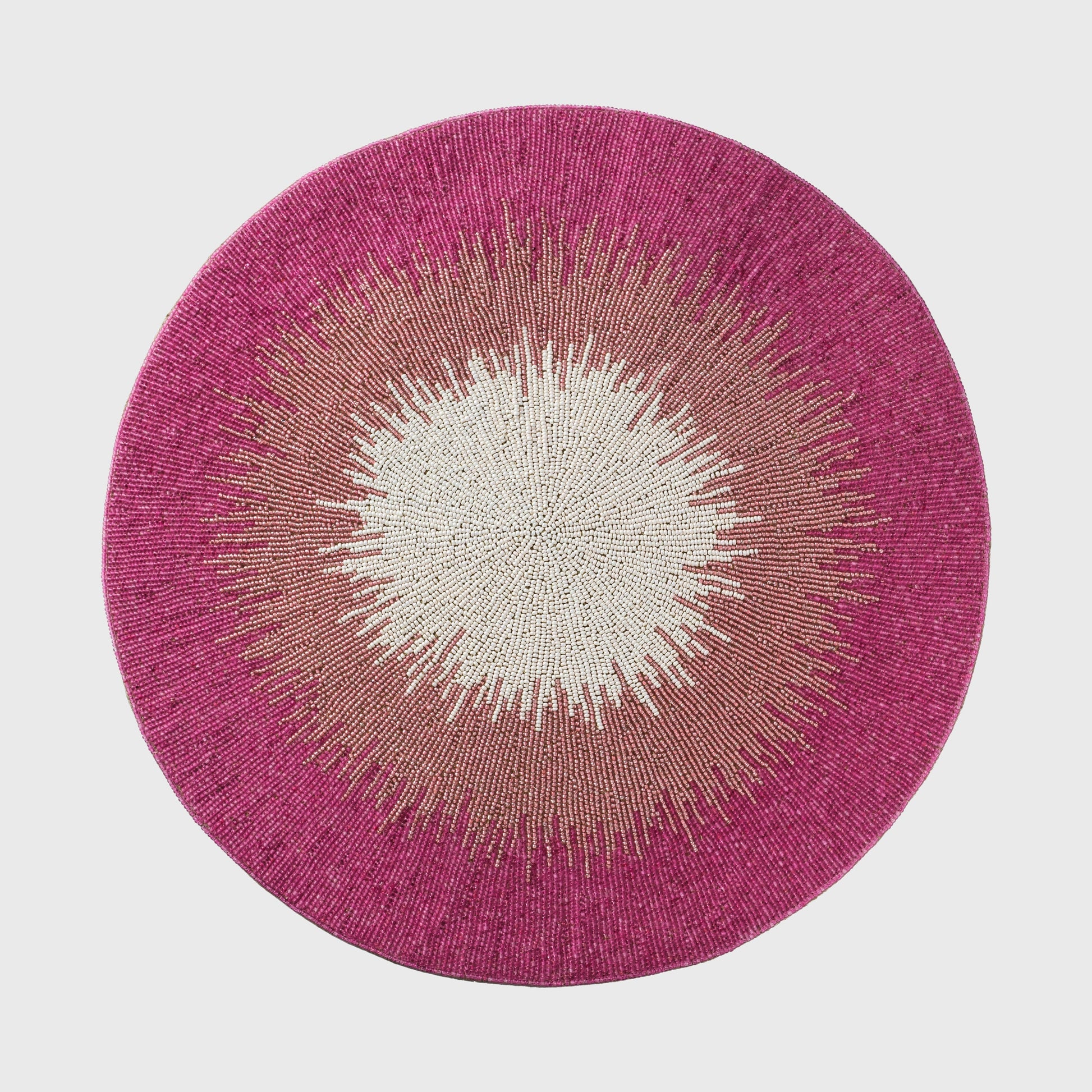 Pink ombre hand-beaded placemat top view