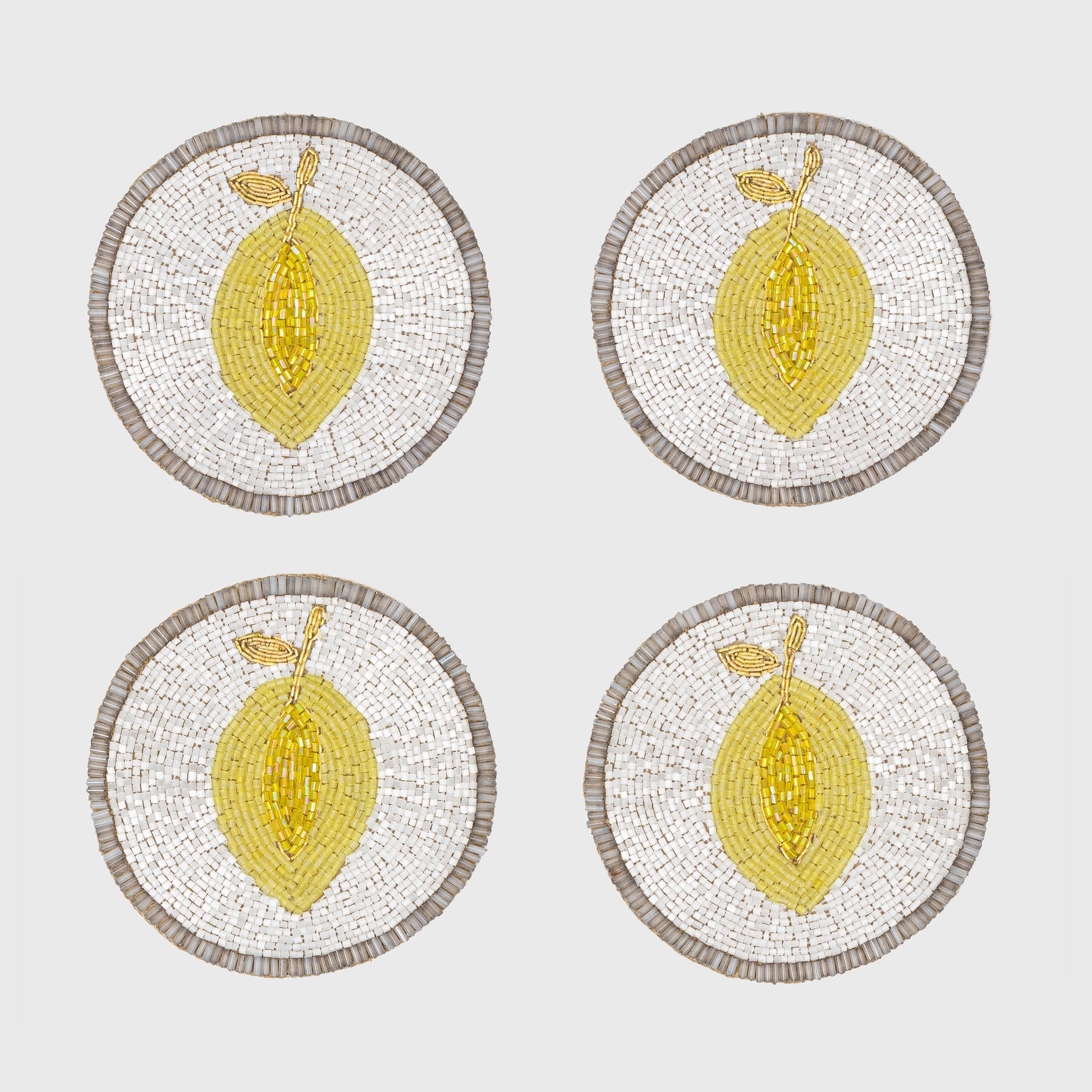 set of lemon coasters on table