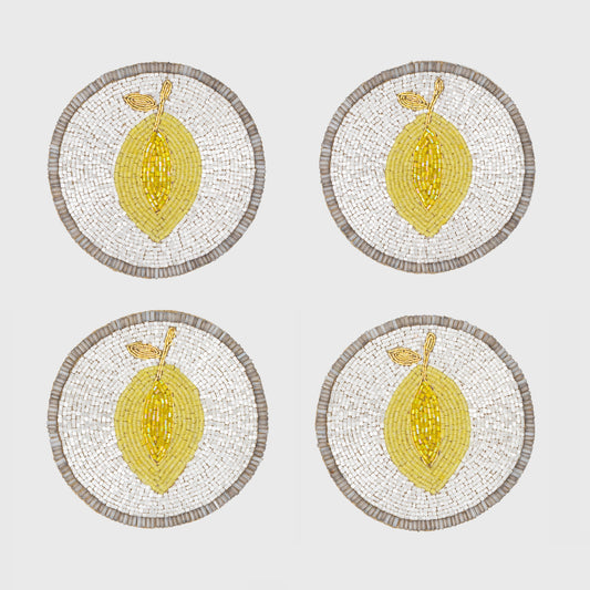 set of lemon coasters on table