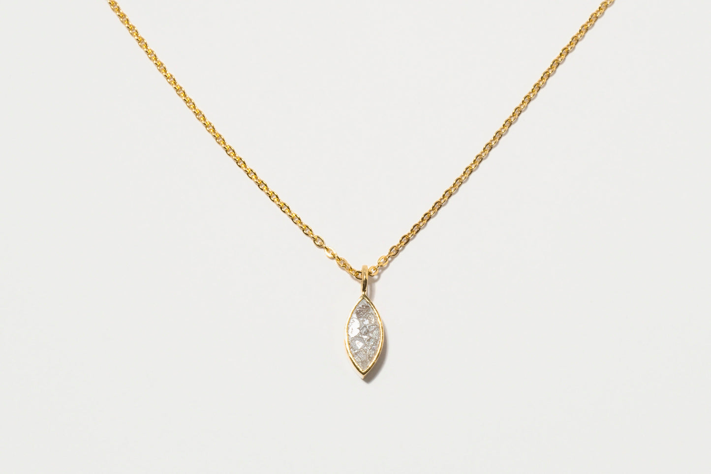 Nayika Gold Vermeil Pendant Necklace Raw Diamond Slice in White Resin.
