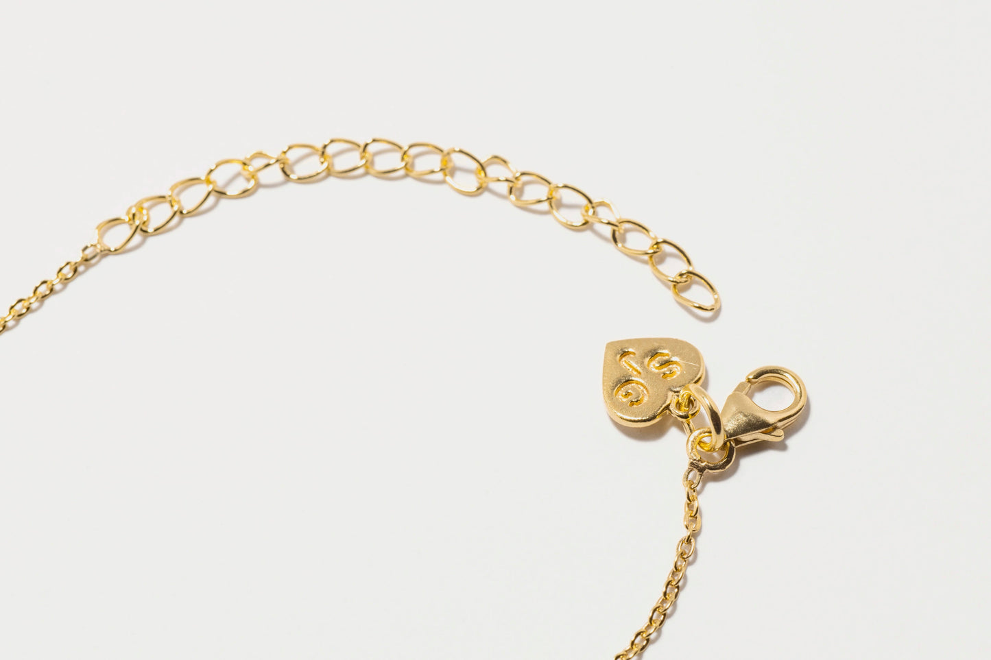 Nayika Gold Vermeil Pendant Necklace Raw Diamond Slice in White Resin.