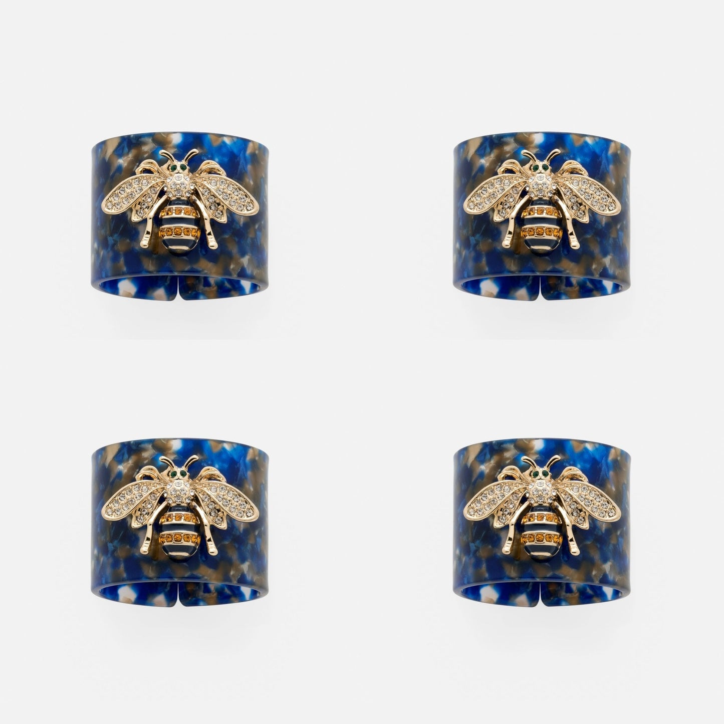 Stripey bee resin napkin rings, blue tortoiseshell, set of four