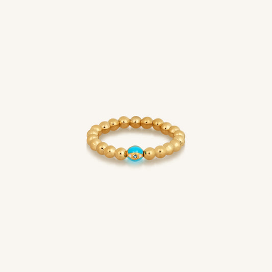 Tranquil Visions Gold Evil Eye Ring — Blue Topaz Stretch Band