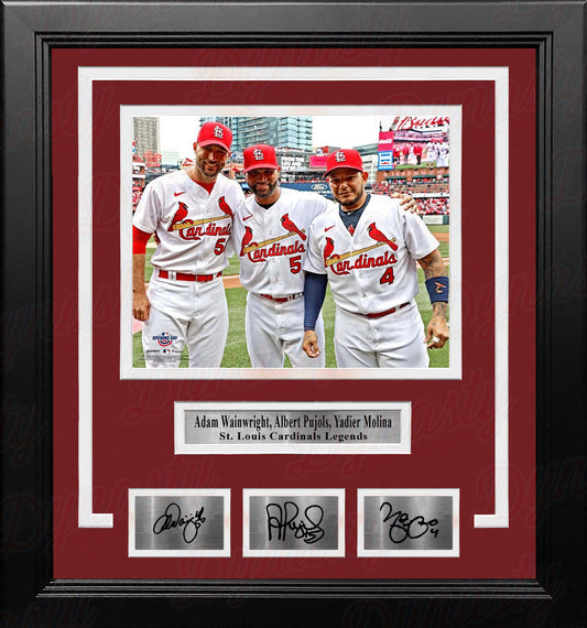 Framed photo of three St. Louis Cardinals baseball players with signatures below.