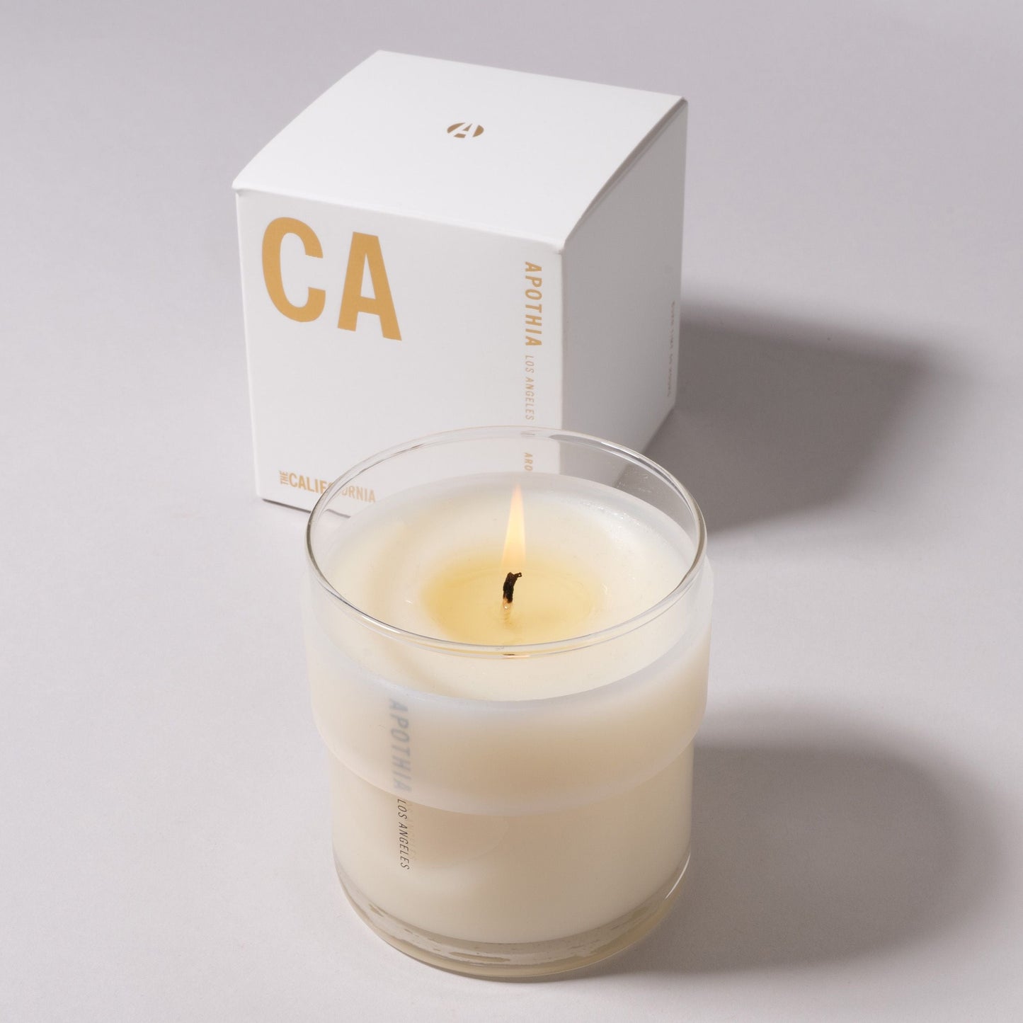 California Candle with Exotic Flowers, Green Leaves, Citrus & Musk