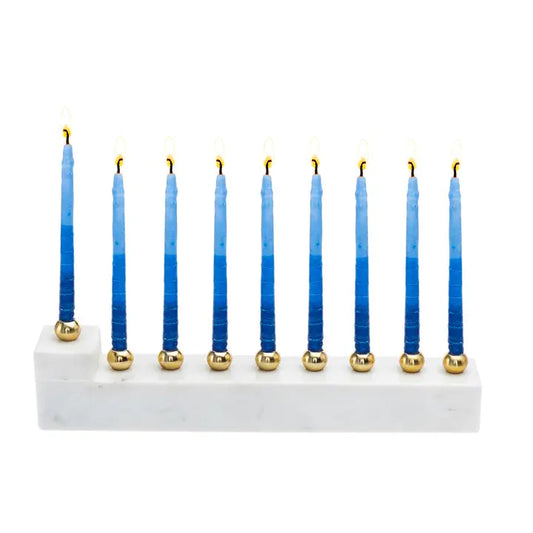 A marble menorah with blue and gold colors, featuring a row of candles for Hanukkah.
